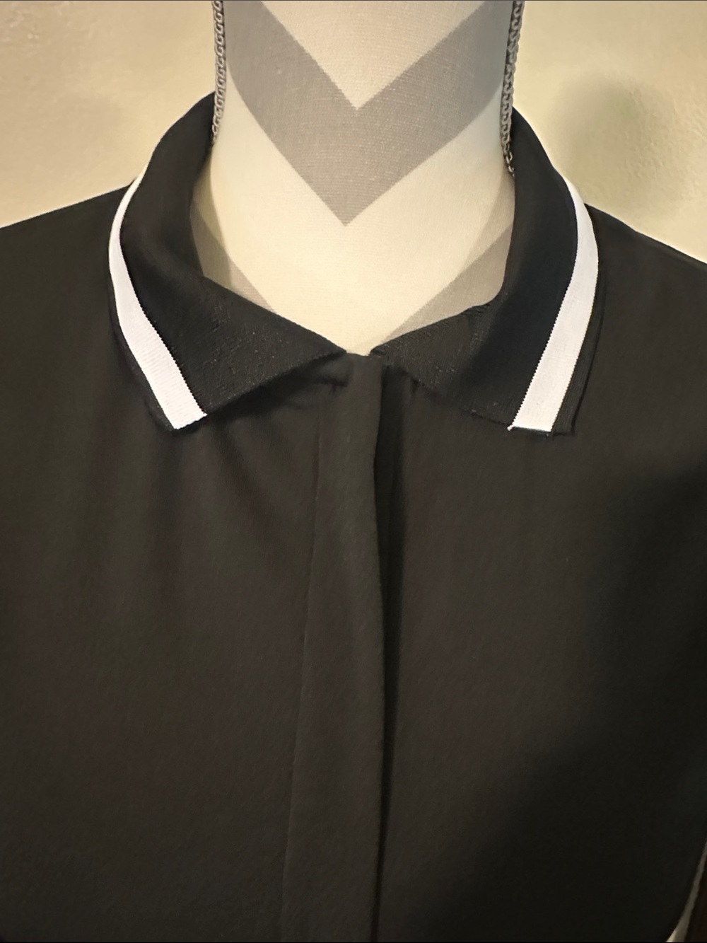 Black Sleeveless Pleated Polo Dress with White Trim - Picture 2 of 4